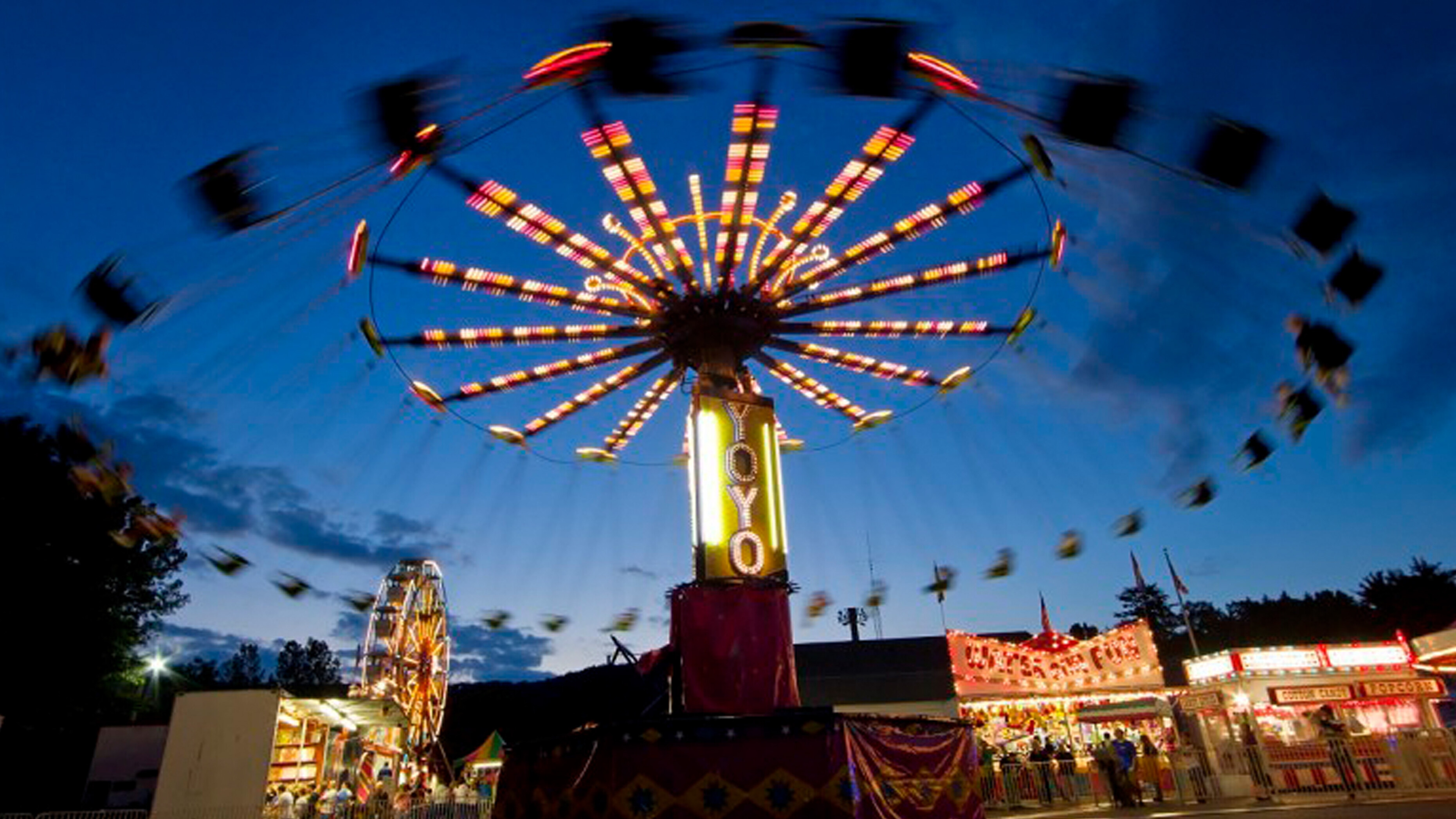 A spinning swings ride in motion at the Firemens Carnival in Beacon Falls CT