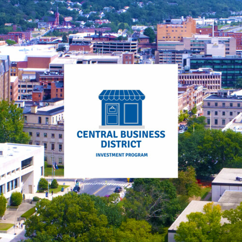 Central Business District Investment Program logo over image of downtown Waterbury, CT