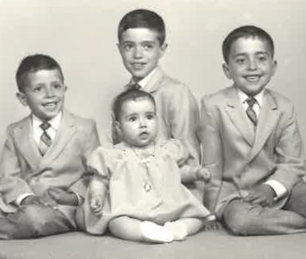 A black and white photo of Frank Tavera of Waterbury as a young child with his siblings