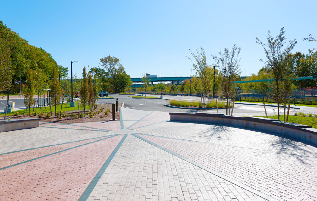 View of the walking foyer with new parking lot in the background of the Waterbury Metro North train station